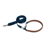 Crossbody dog leash in blue with a soft leather handle and versatile hands-free or handheld walking style.