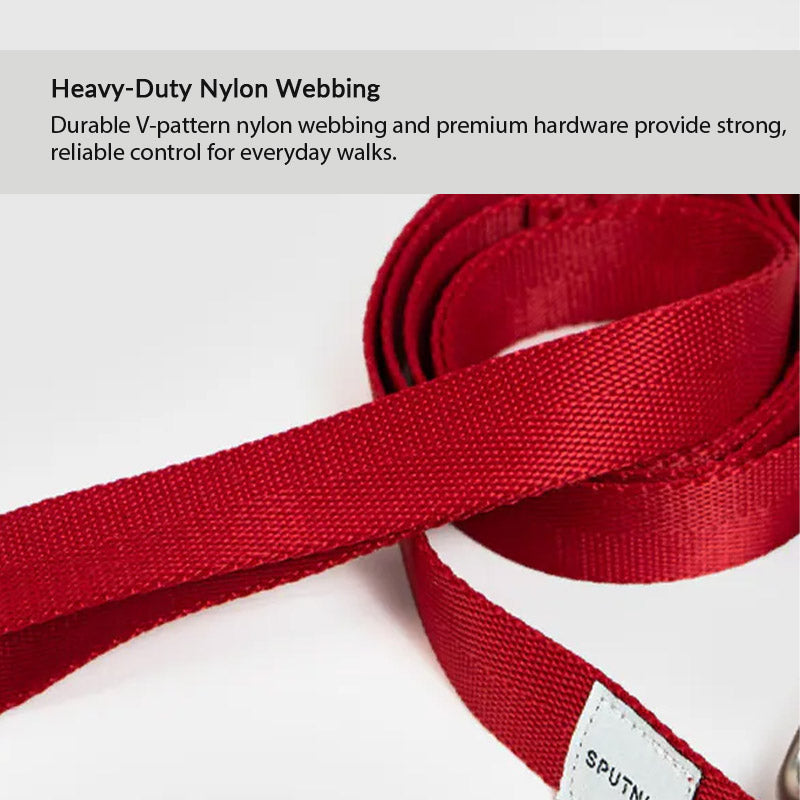 Heavy-duty nylon dog leash in red with V-pattern webbing for dependable control on daily walks and outings.