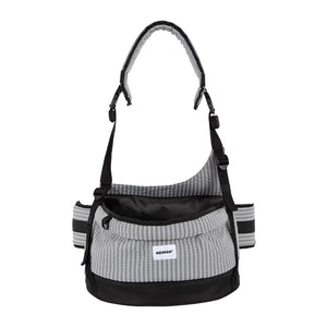 Pet hip seat carrier in mist gray with an open-top seat and adjustable shoulder strap for daily adventures.